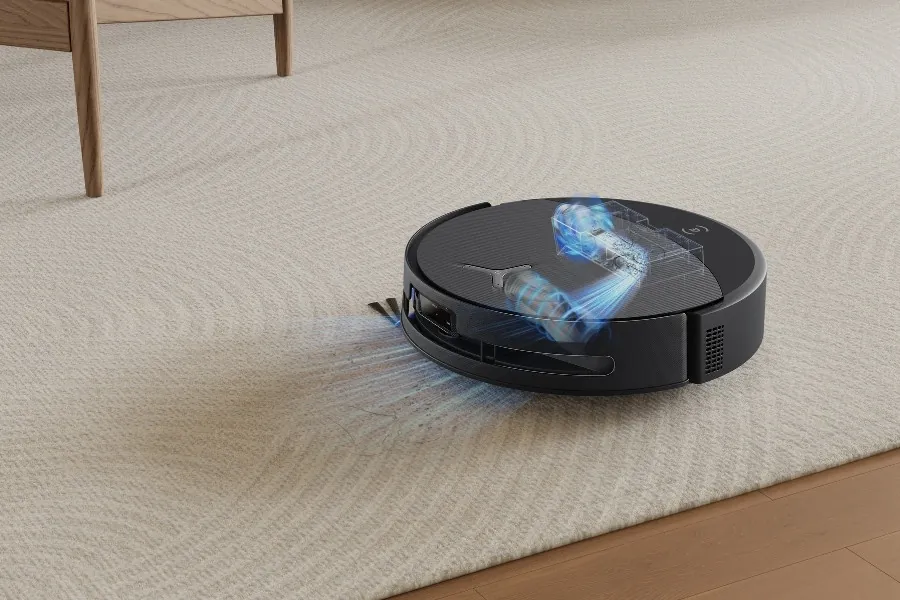 A person using a smartphone app to control their robot vacuum cleaner.
